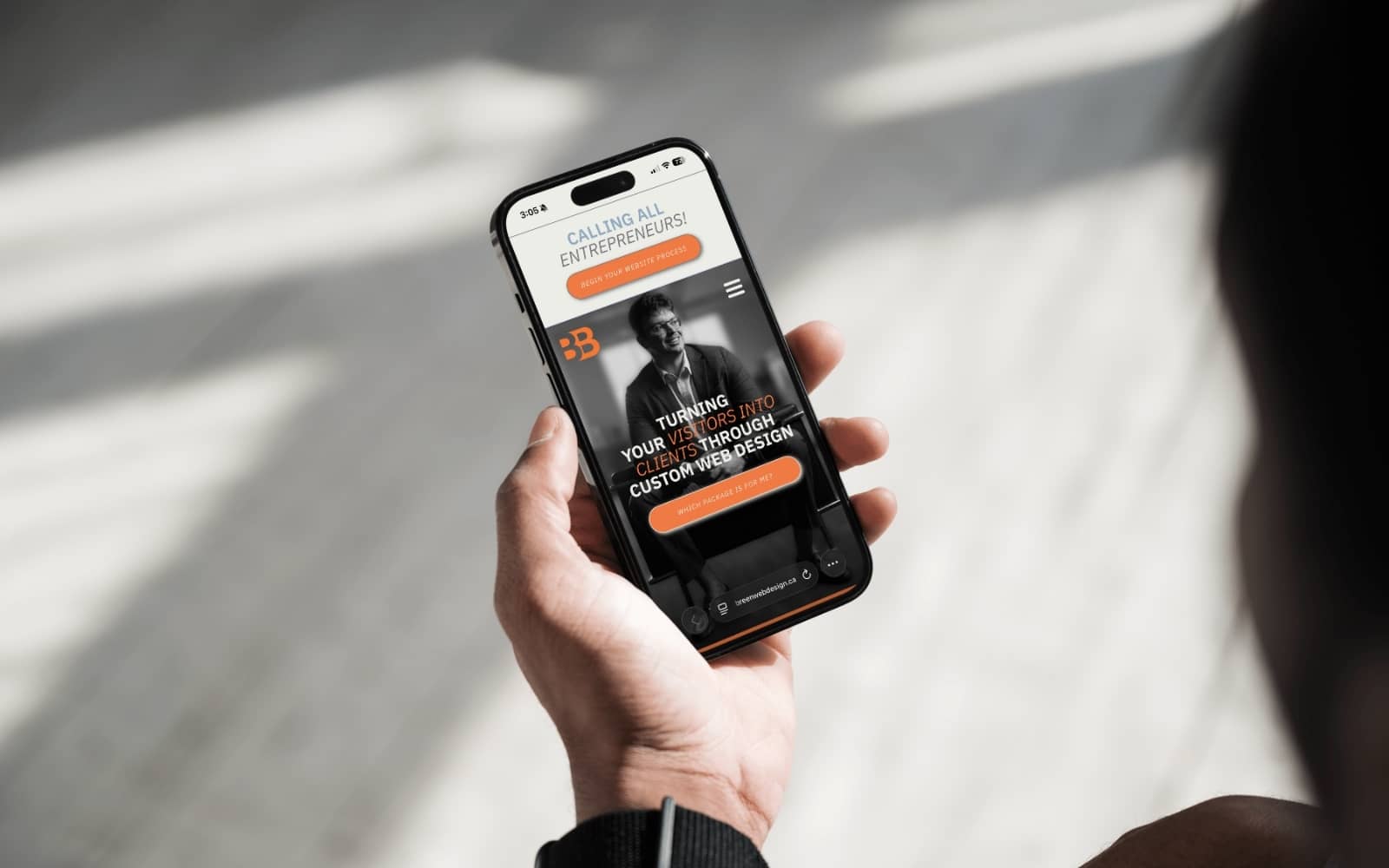 A man viewing a responsive mobile friendly website design on his phone